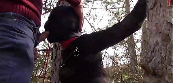  Outdoor sex in the wood. Wearing sexy clothes and high heels, bound, throated and fucked